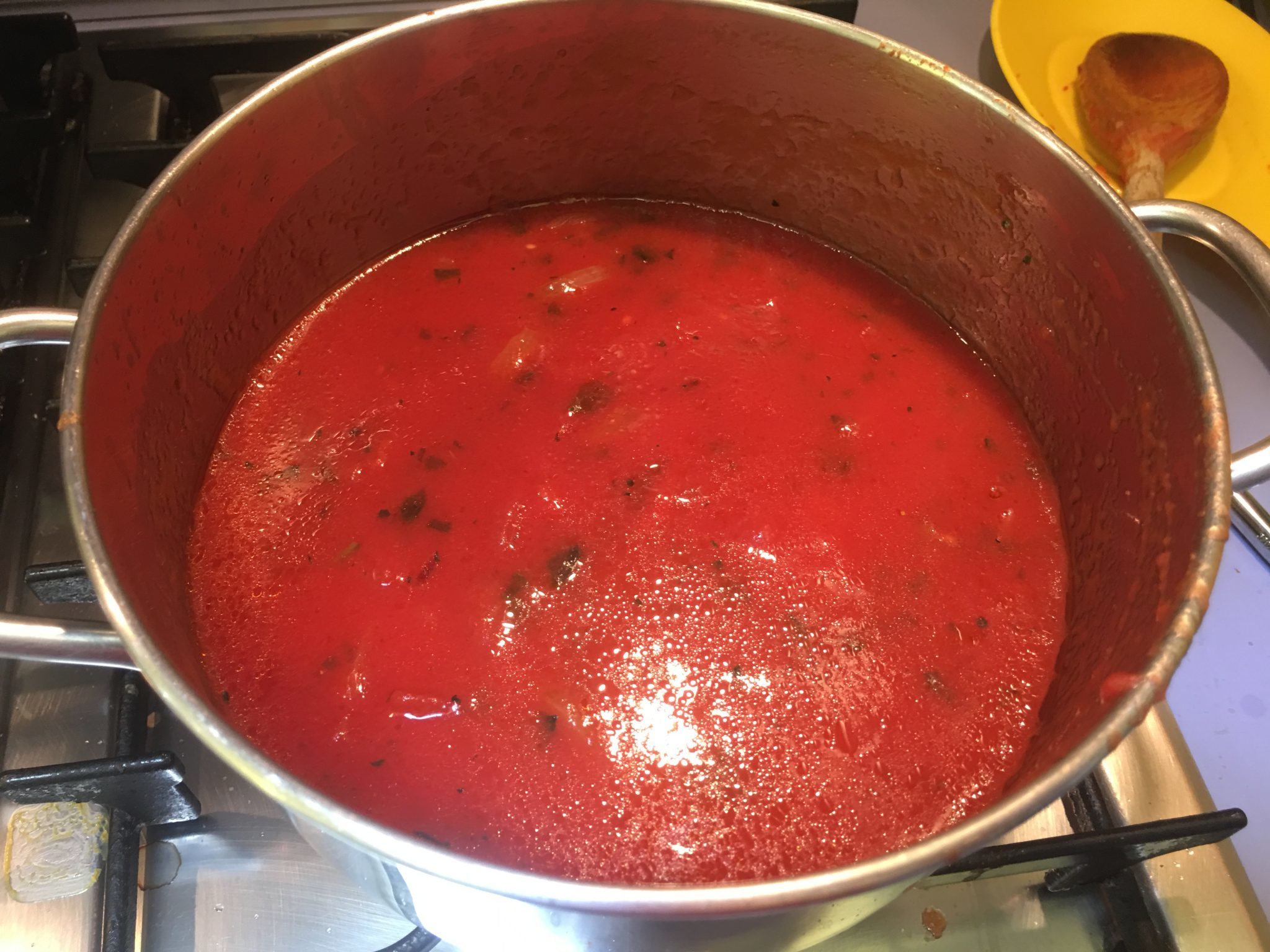 Patate alla parmigiana - sugo in cottura